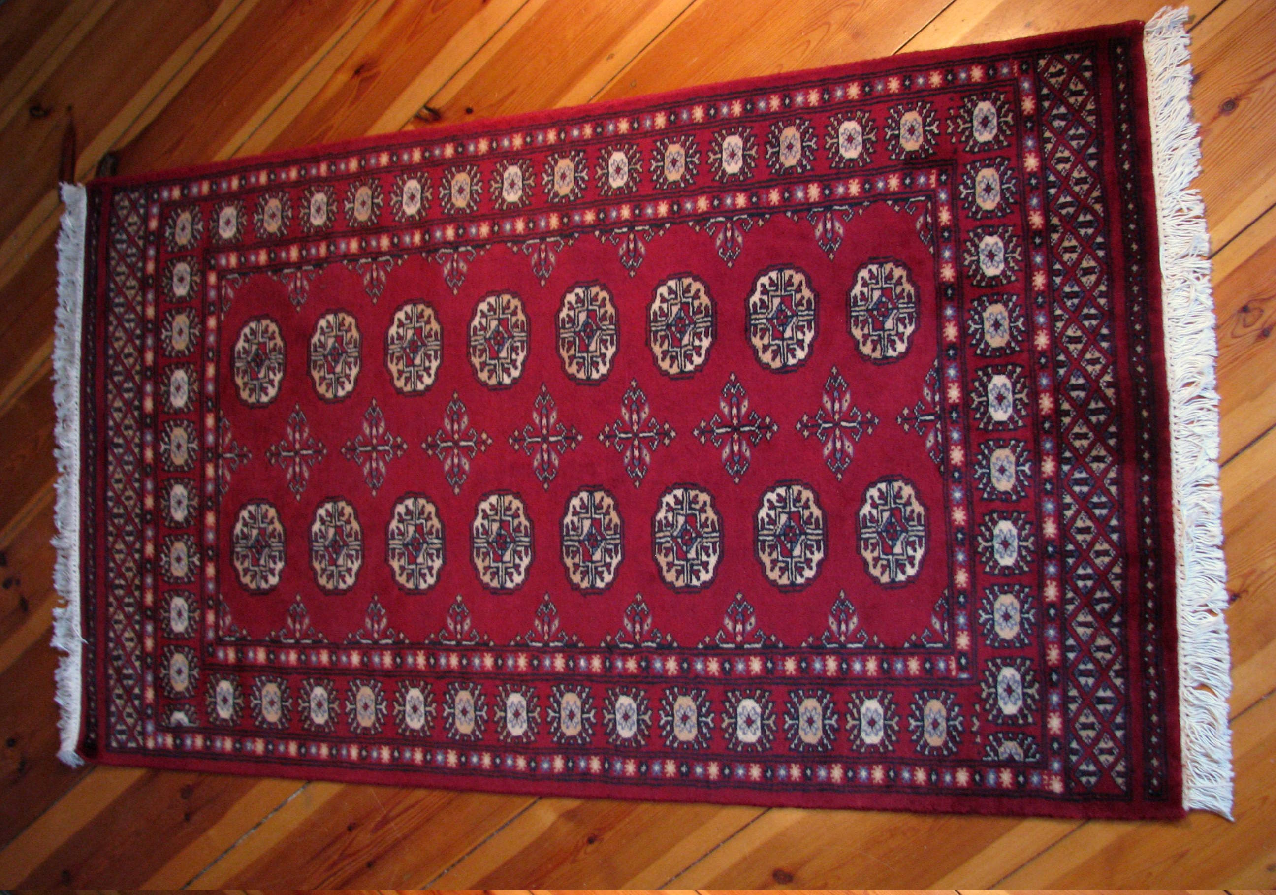 dark red tekke classical bukhara rug