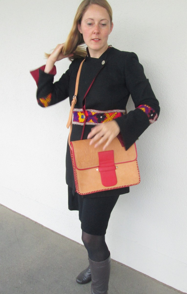 red and natural leather bag
