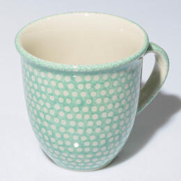 green mug, white dotted