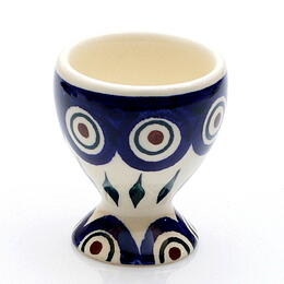 eggcup with peacock and leaves