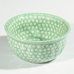 green bowl with white dots