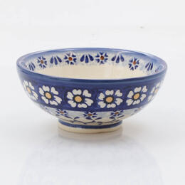 Japanese design bowl qwith white and yellow flowers