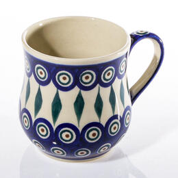 rustic mug with peacock leaf pattern