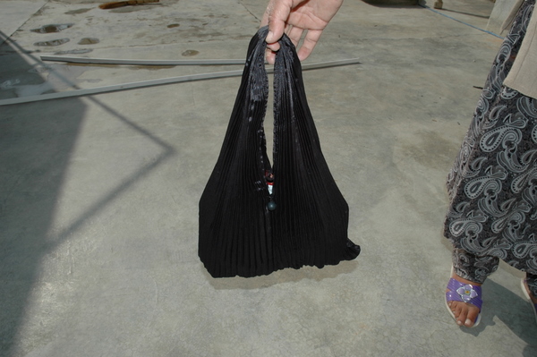 Gundara - Black Burqa Handbag by Zardozi - made by Afghan refugees